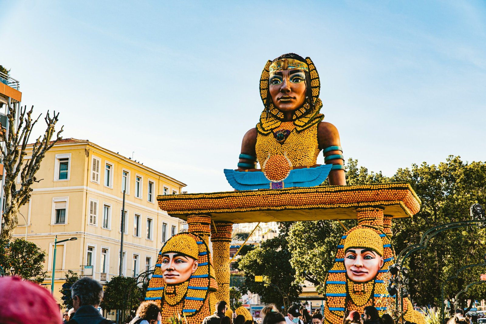 a group of people standing in front of a float