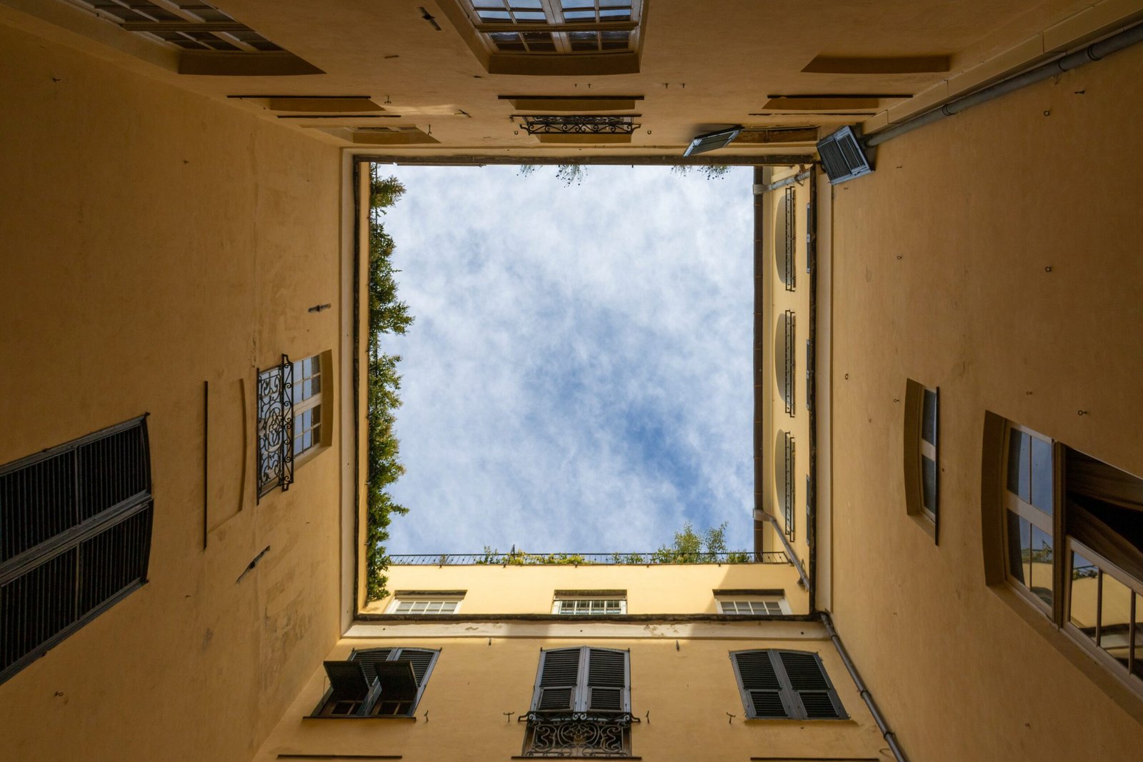 low angle photography of brown building